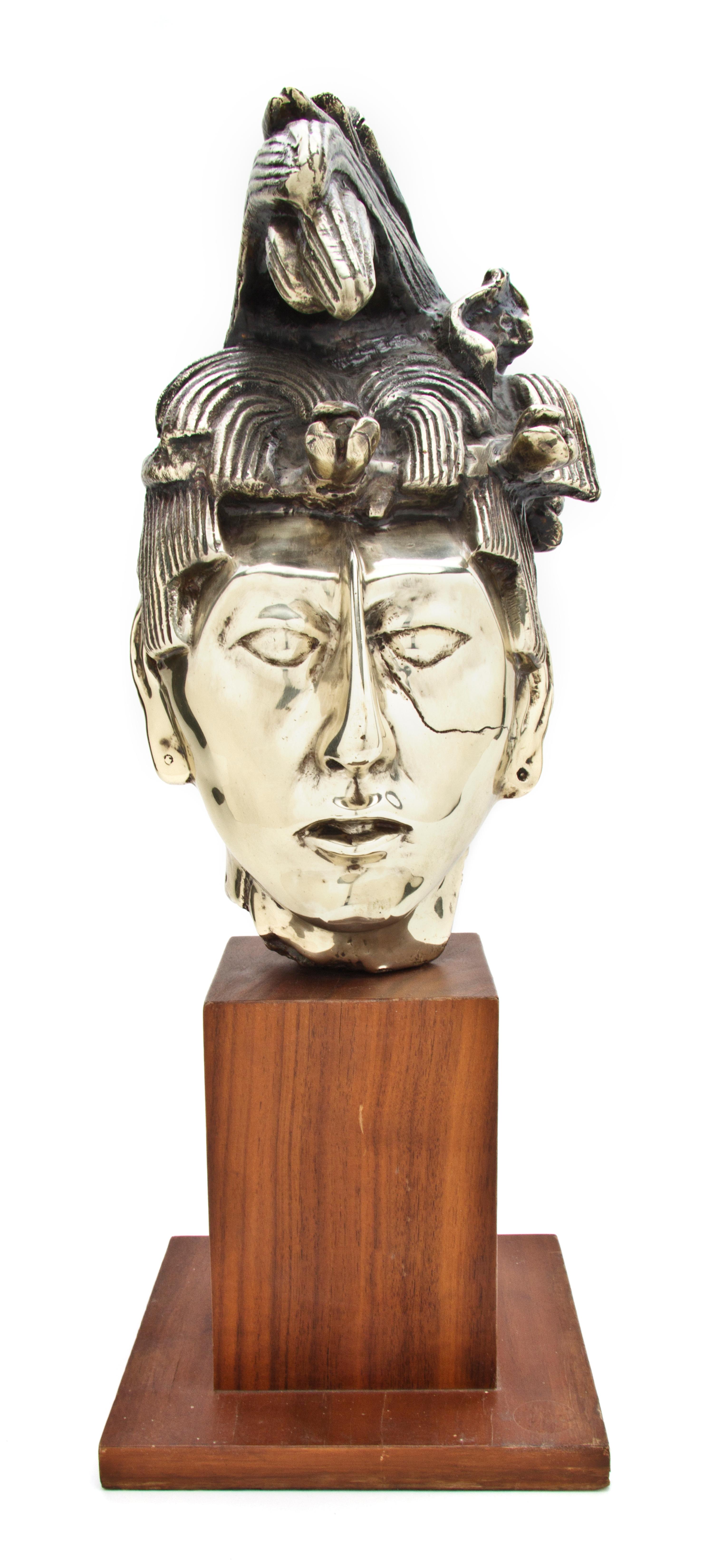 A Silvered Metal Bust, Height 14 1/4 inches.