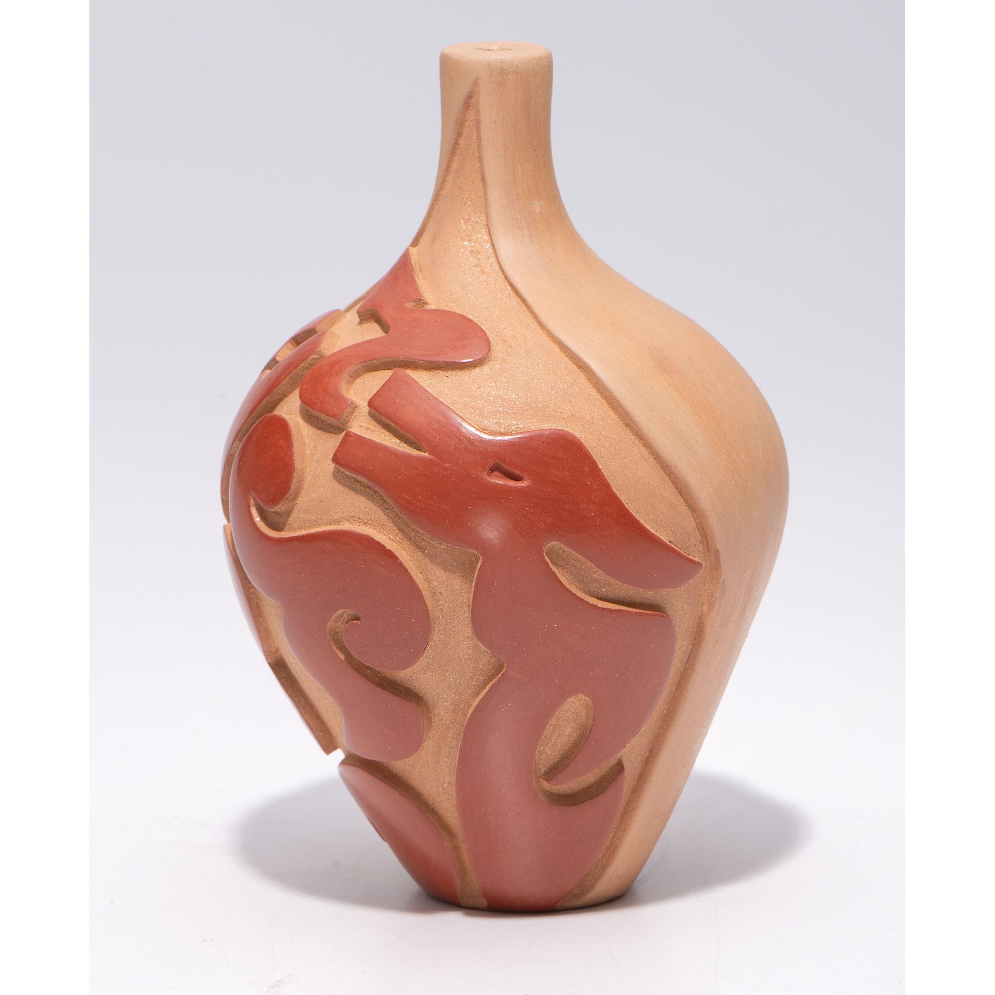 Carved Micaceous Redware Jar, with Avanyu and Raindrops