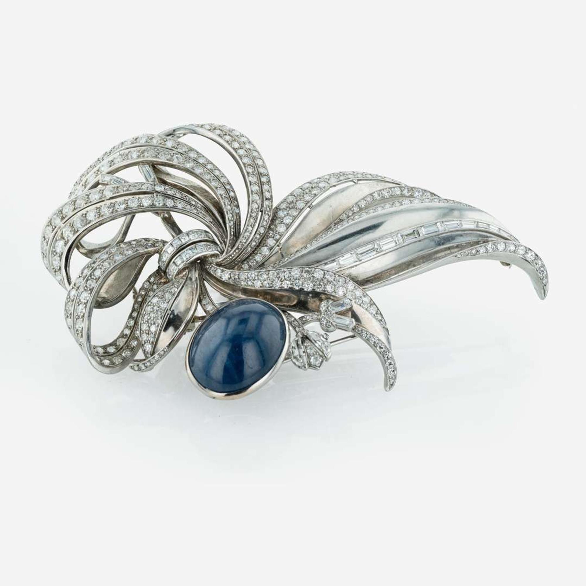 A Large Sapphire, Platinum, and Diamond Brooch