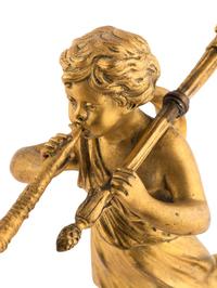 A Pair of French Gilt Bronze Figural Two-Light Candelabra