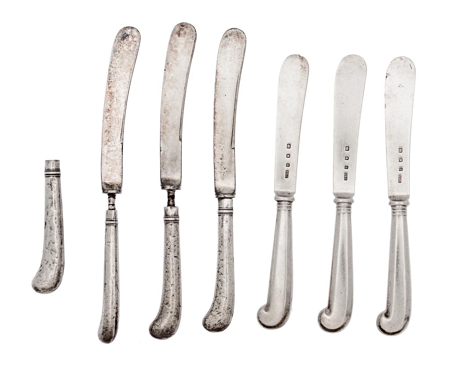 Seven English Silver Pistol Handled Butter Knives, , comprising three Crichton and four H.F. & Co., one of the later lacking blade.