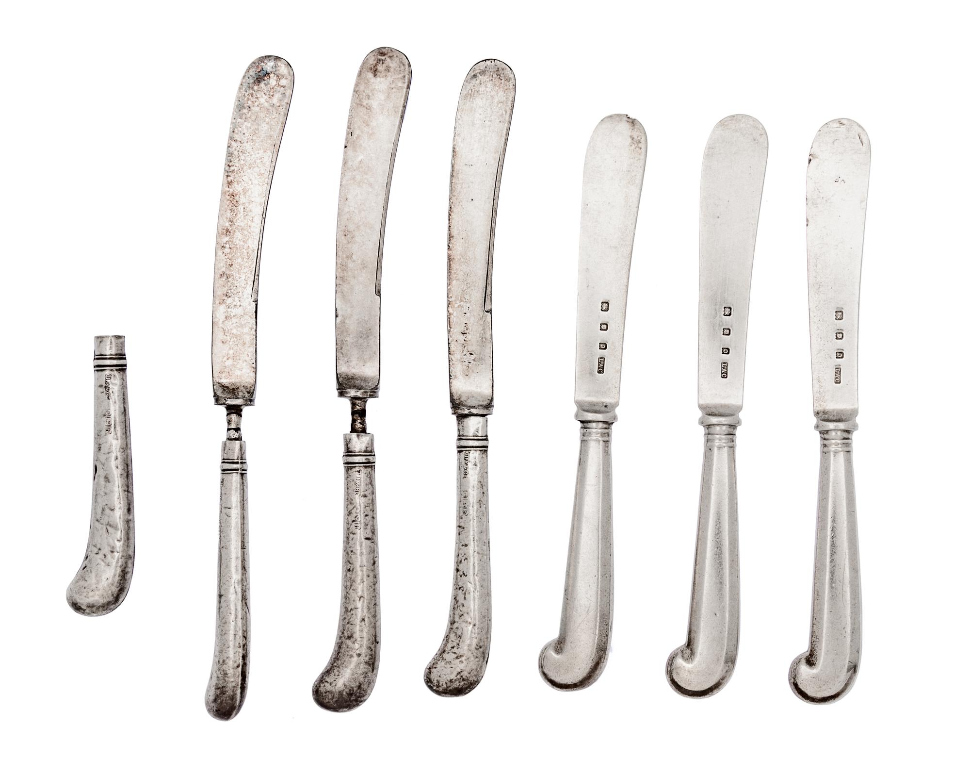 Seven English Silver Pistol Handled Butter Knives, , comprising three Crichton and four H.F. & Co., one of the later lacking blade.