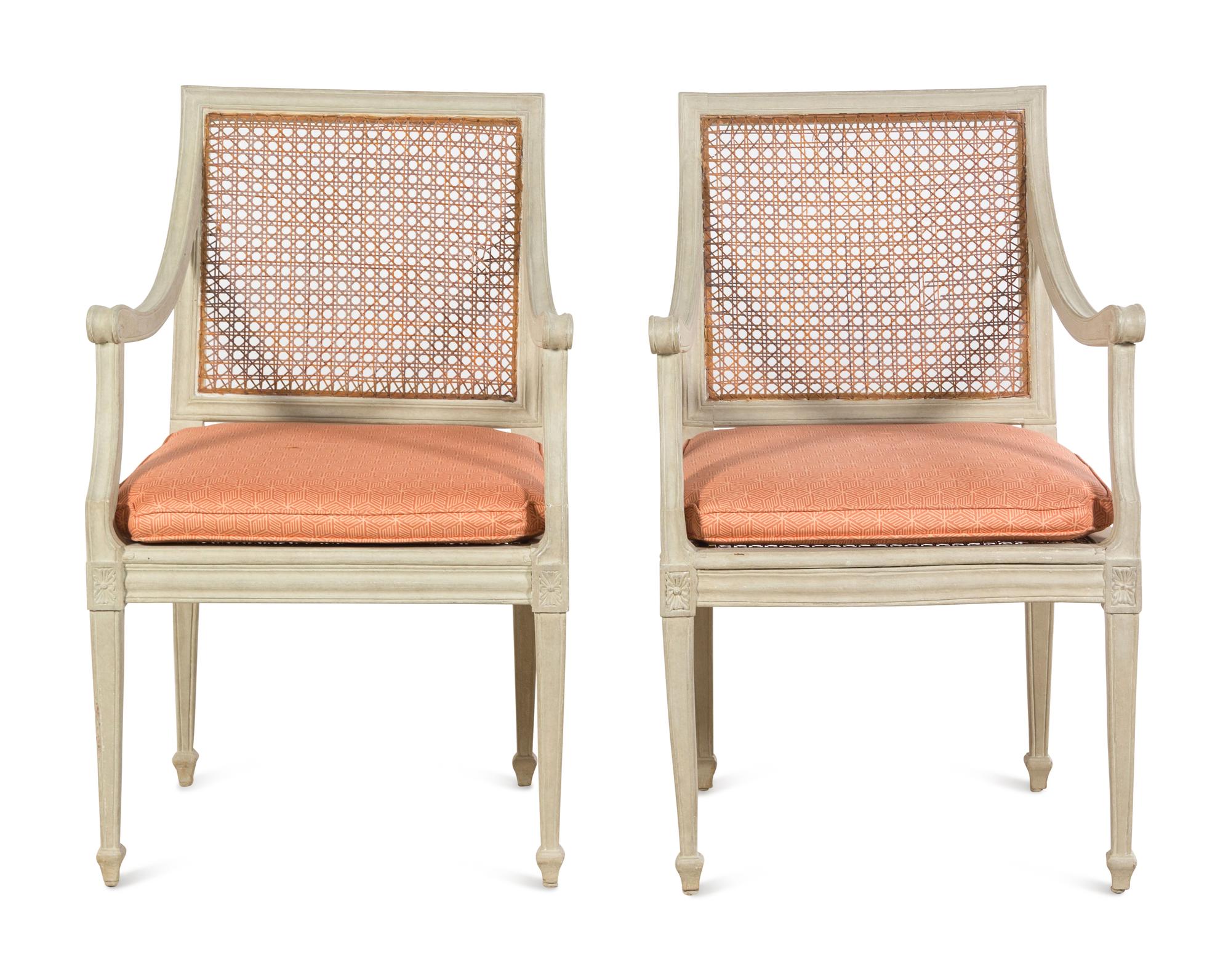 A Pair of Italian Painted and Caned Armchairs