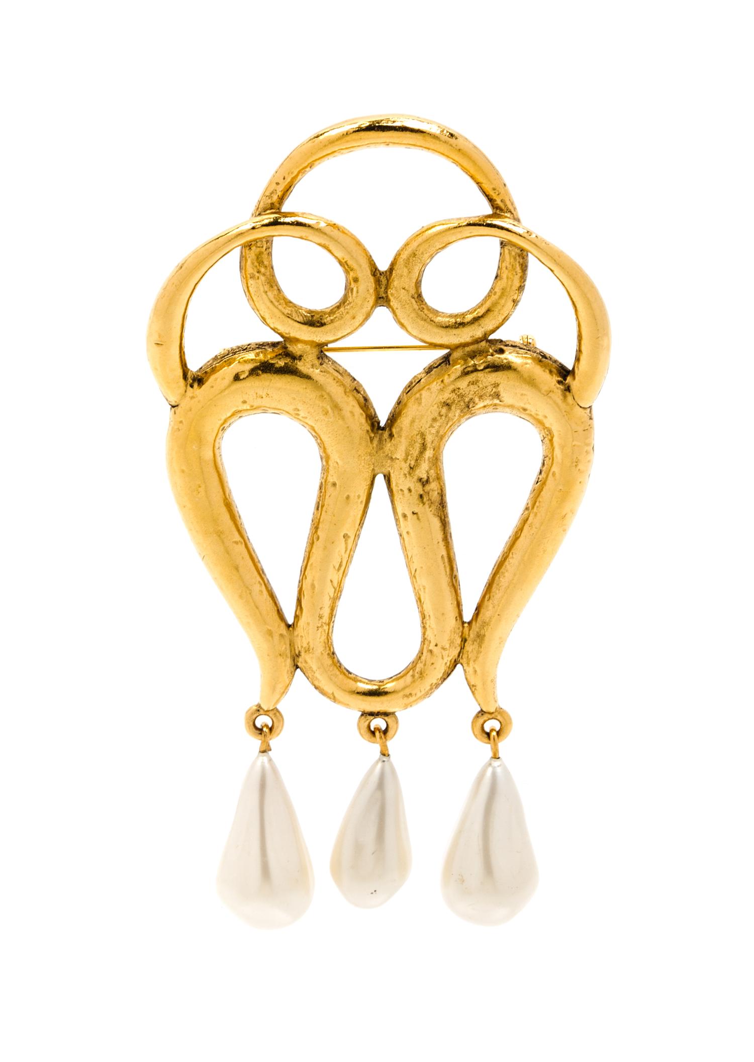 A Chanel Goldtone Brooch,