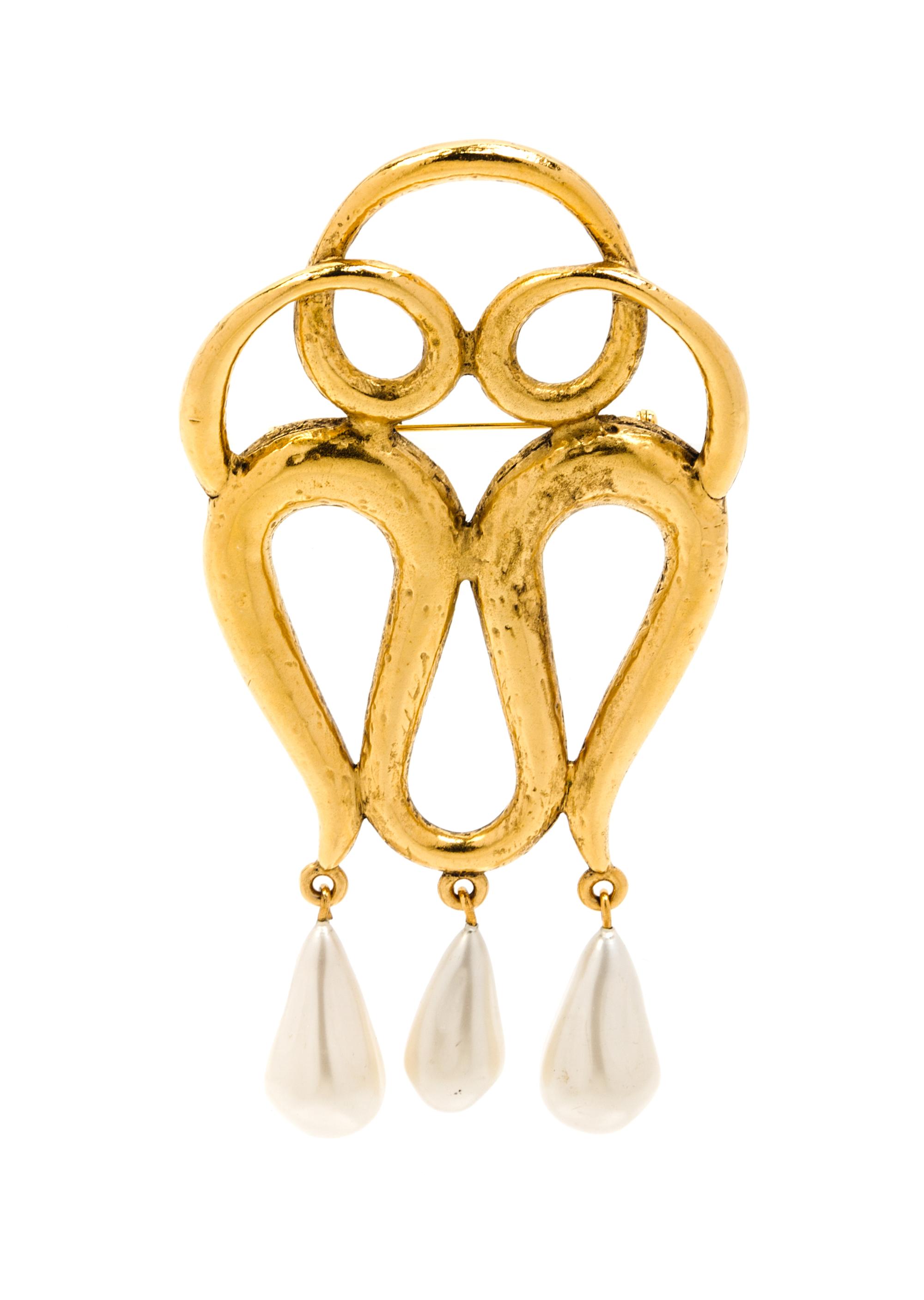 A Chanel Goldtone Brooch,