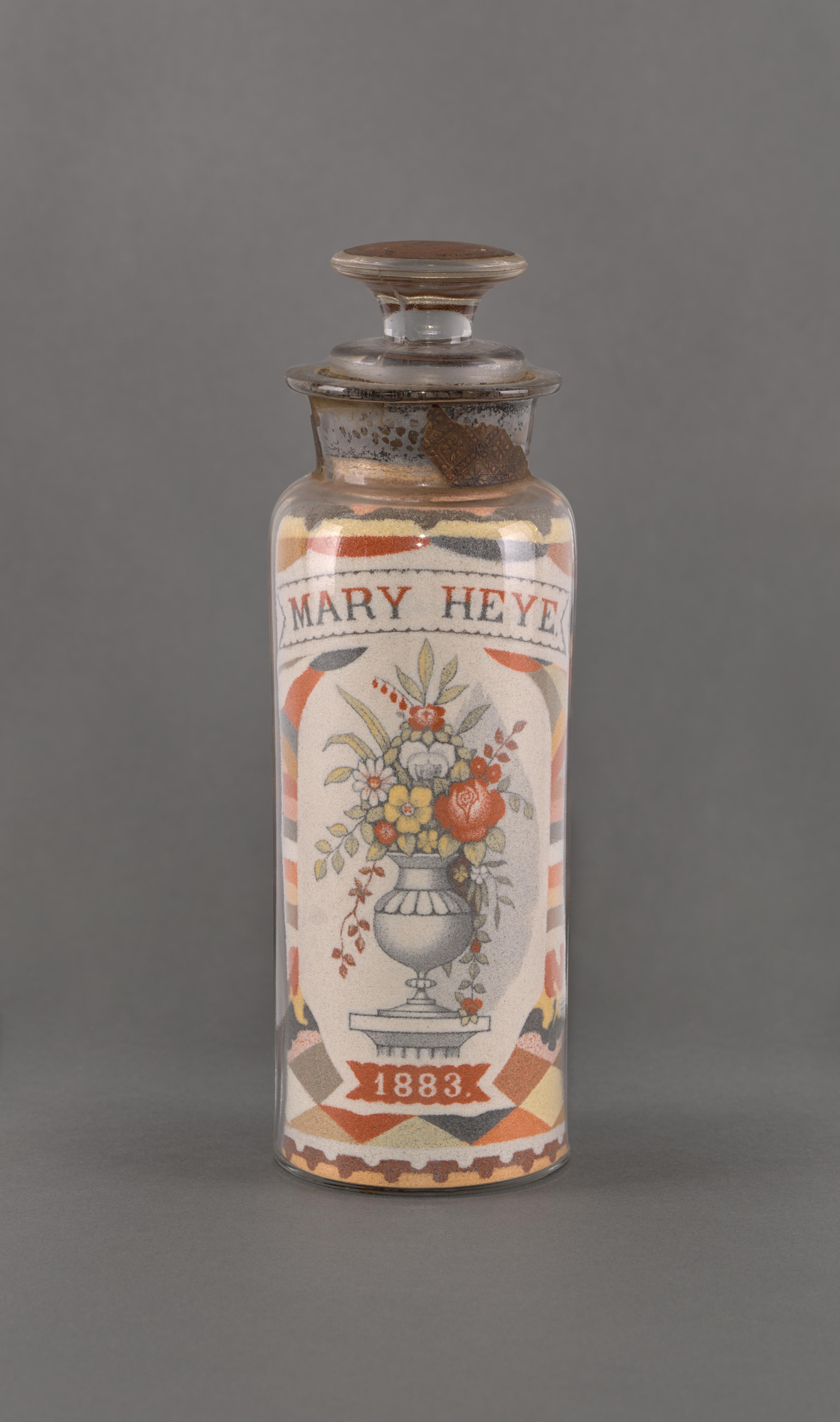 A Pair of Andrew Clemens (American, 1857-1894) 'Sweetheart' Sand Bottles