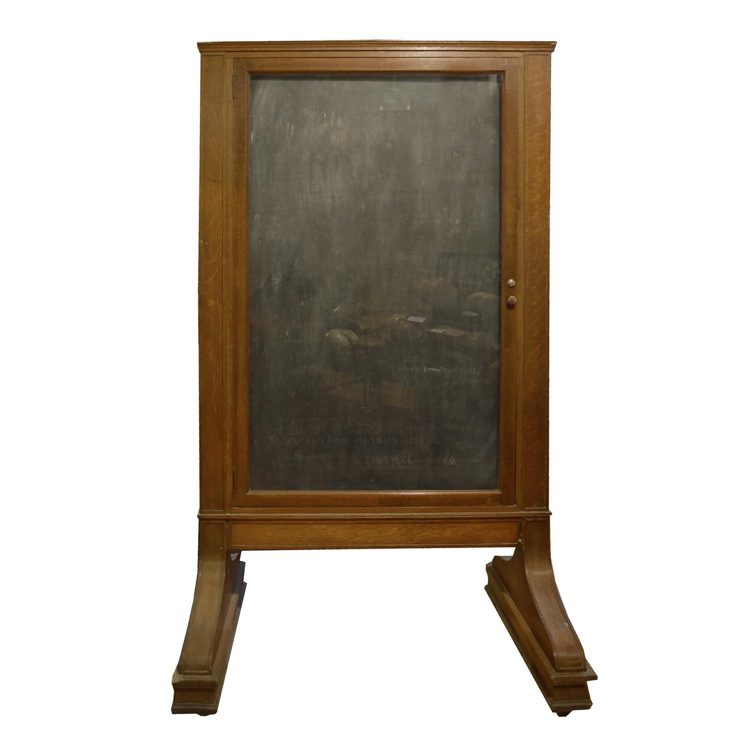 An Oak and Glass Display Board from Chicago's Union Station 47" W x 31" D x 81" H — United States, 20th Century