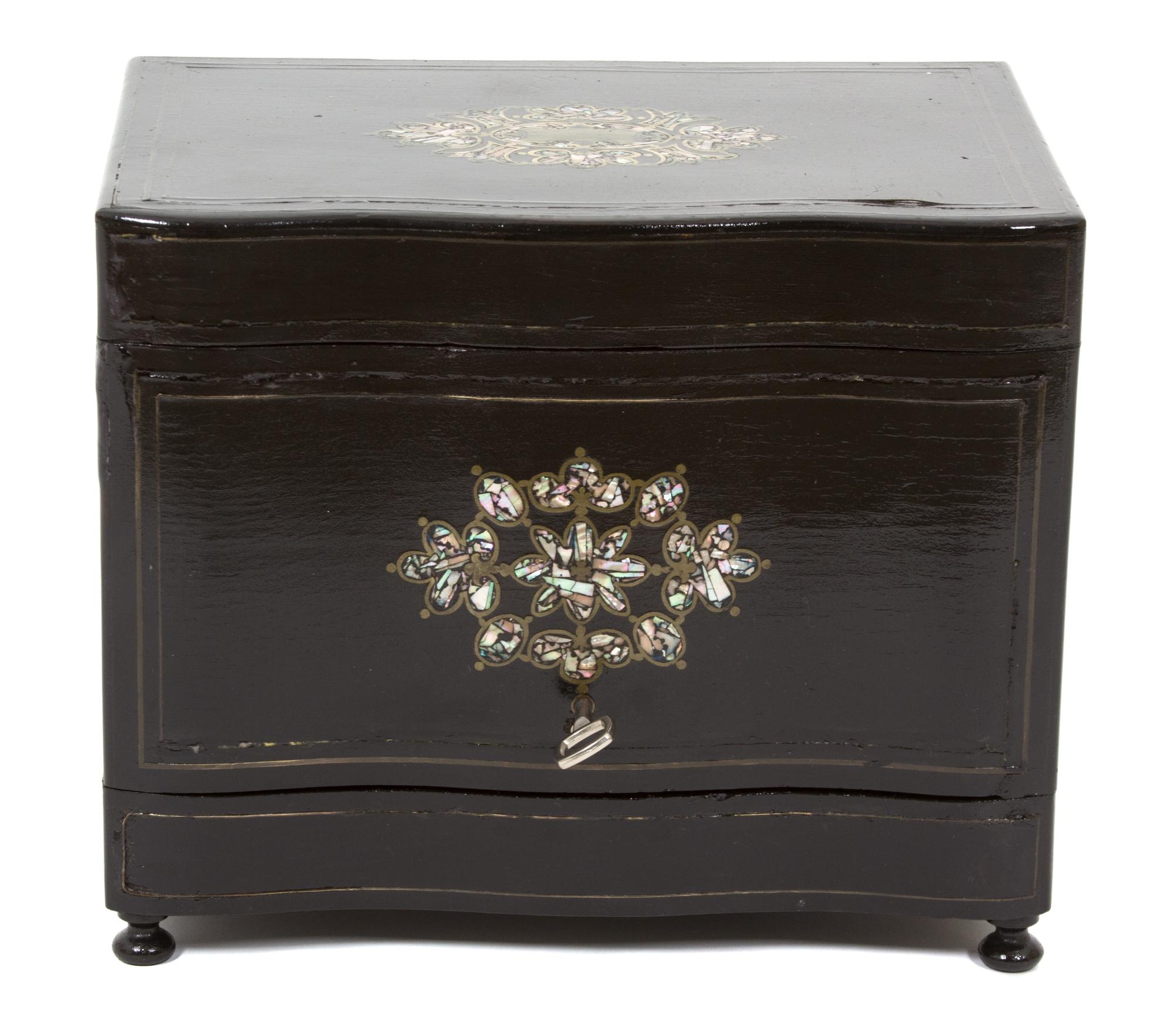 An English Lacquered Mother-of-Pearl Inlaid Tantalus Height 10 1/2 inches. — 19TH CENTURY