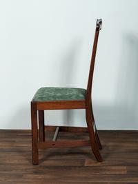 A Set of Six Chippendale Volute-Carved Mahogany Side Chairs