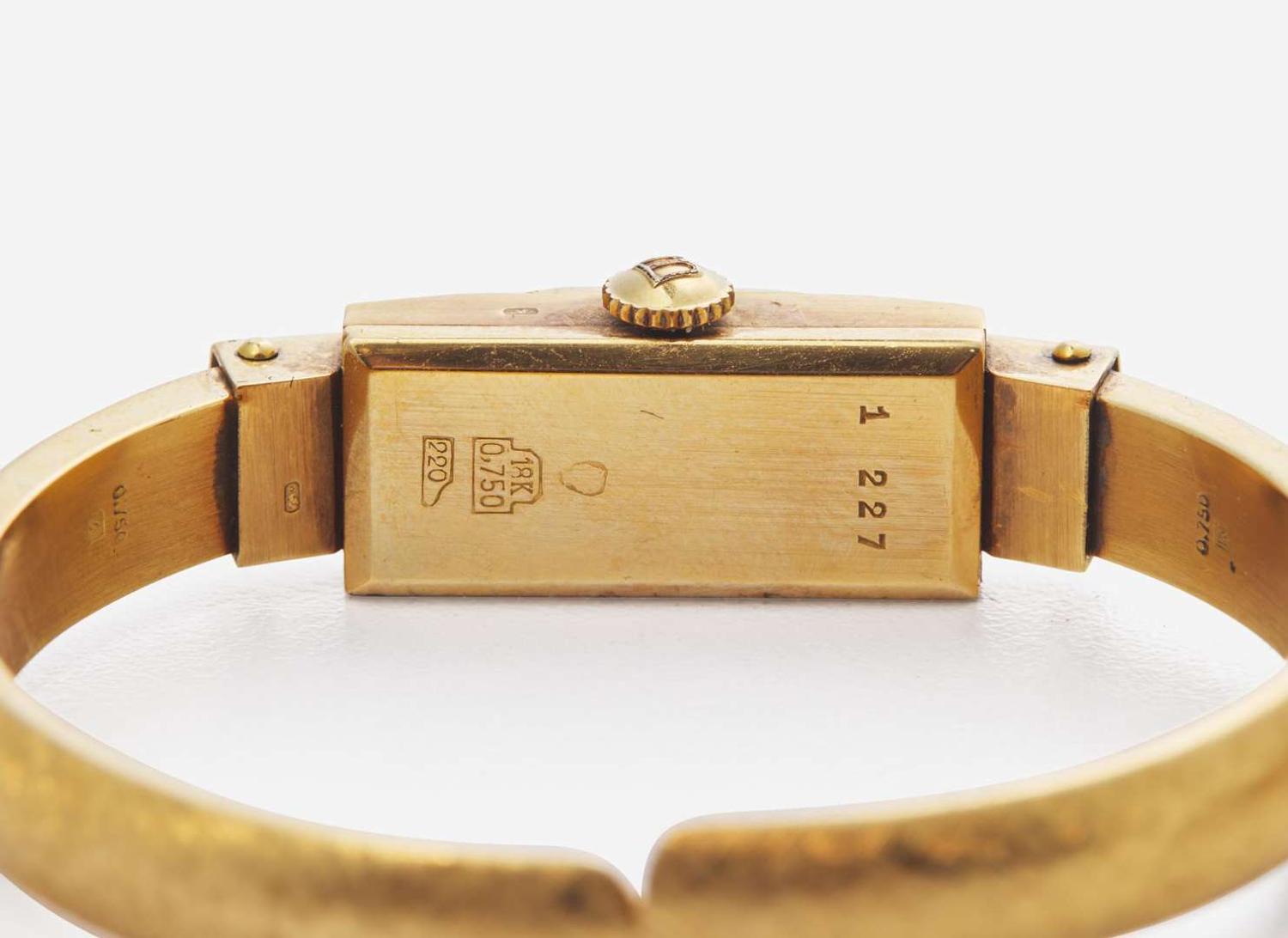 A Set of Two Vintage 18K Yellow Gold Bangle Watches