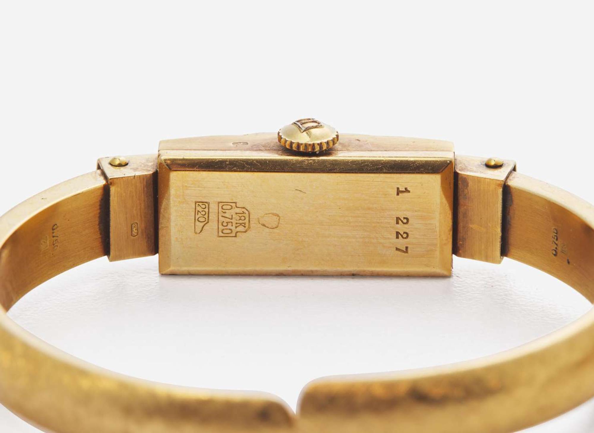 A Set of Two Vintage 18K Yellow Gold Bangle Watches