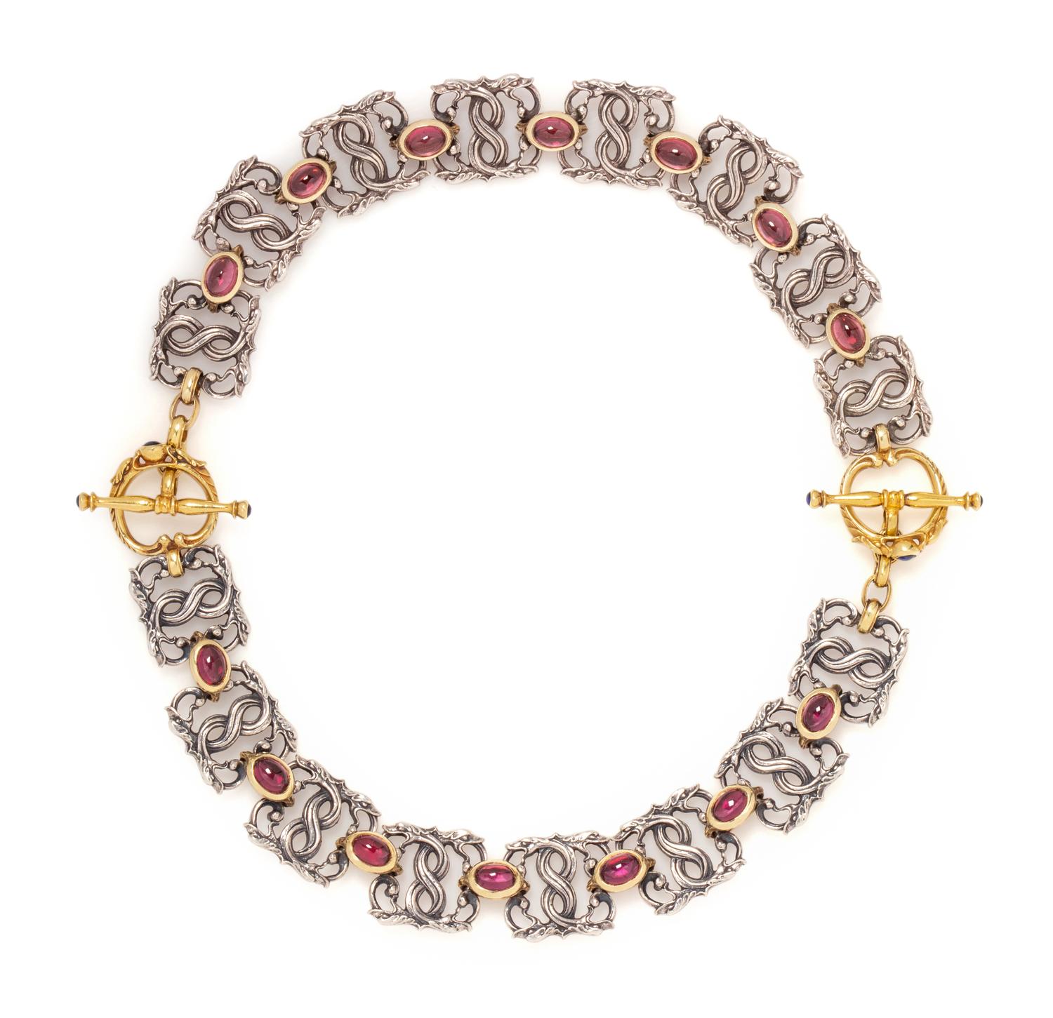 PAUL LANTUCH, PAIR OF STERLING SILVER, YELLOW GOLD AND GARNET BRACELETS