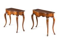 A Pair of Rococo Style Serpentine Console Tables