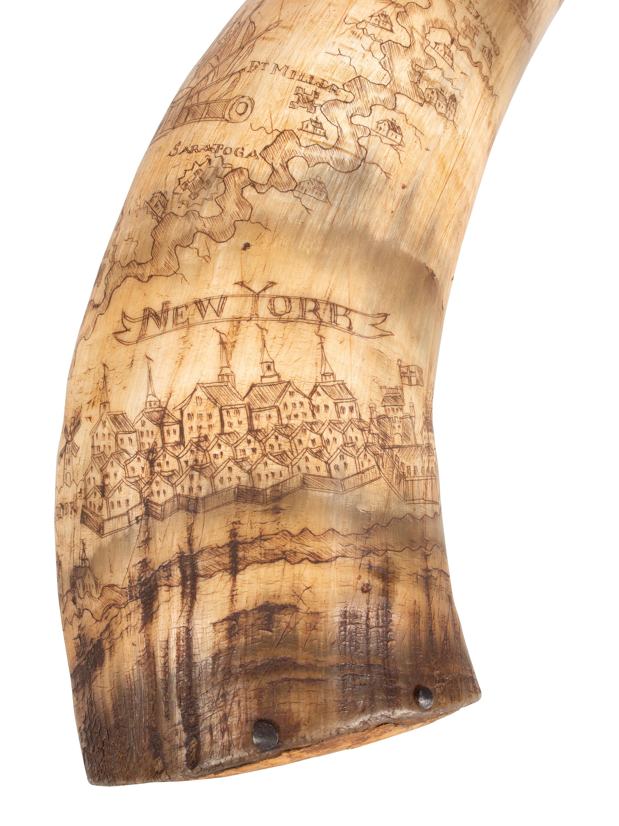 [FRENCH AND INDIAN WAR]. Powder horn featuring fine scrimshaw map of New York, identified to John Hosmer, likely made at Crown Point, 1759.