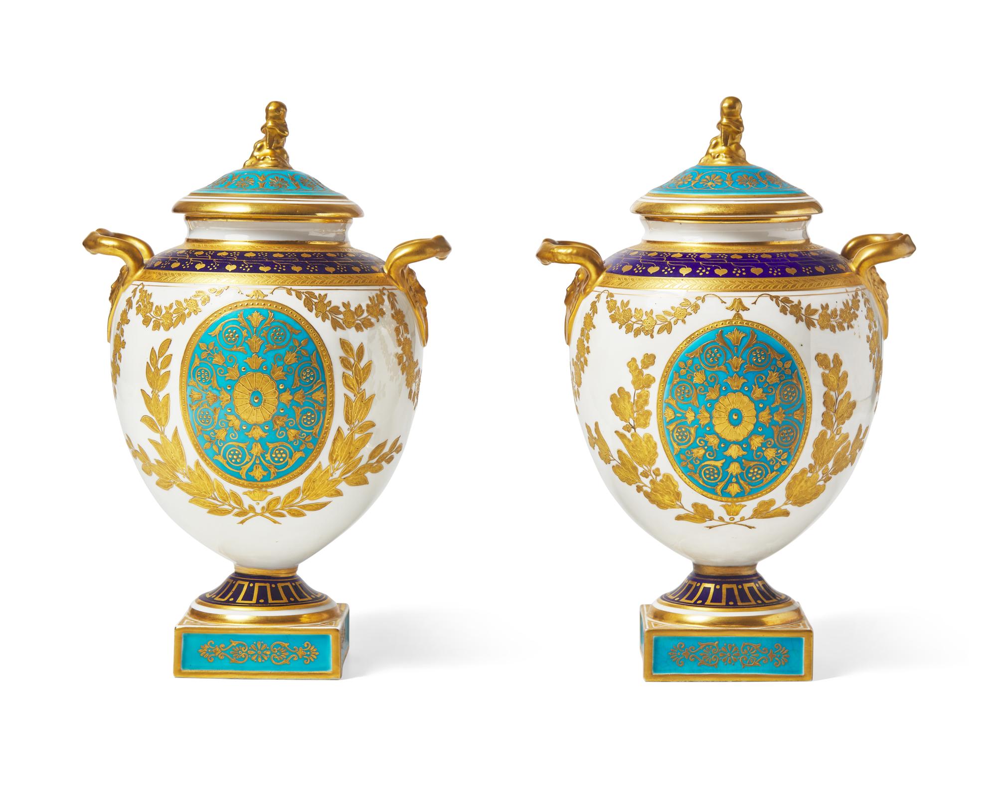 A Pair of Wedgwood Neoclassical Parcel-Gilt Urns
