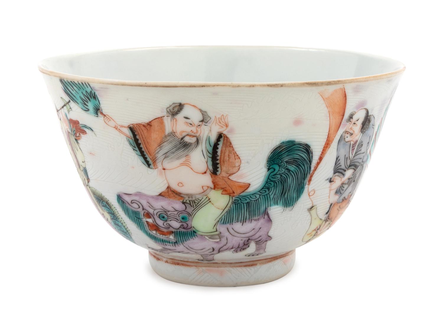 A Famille Rose 'Eight Immortals' Incised and Painted Porcelain Bowl