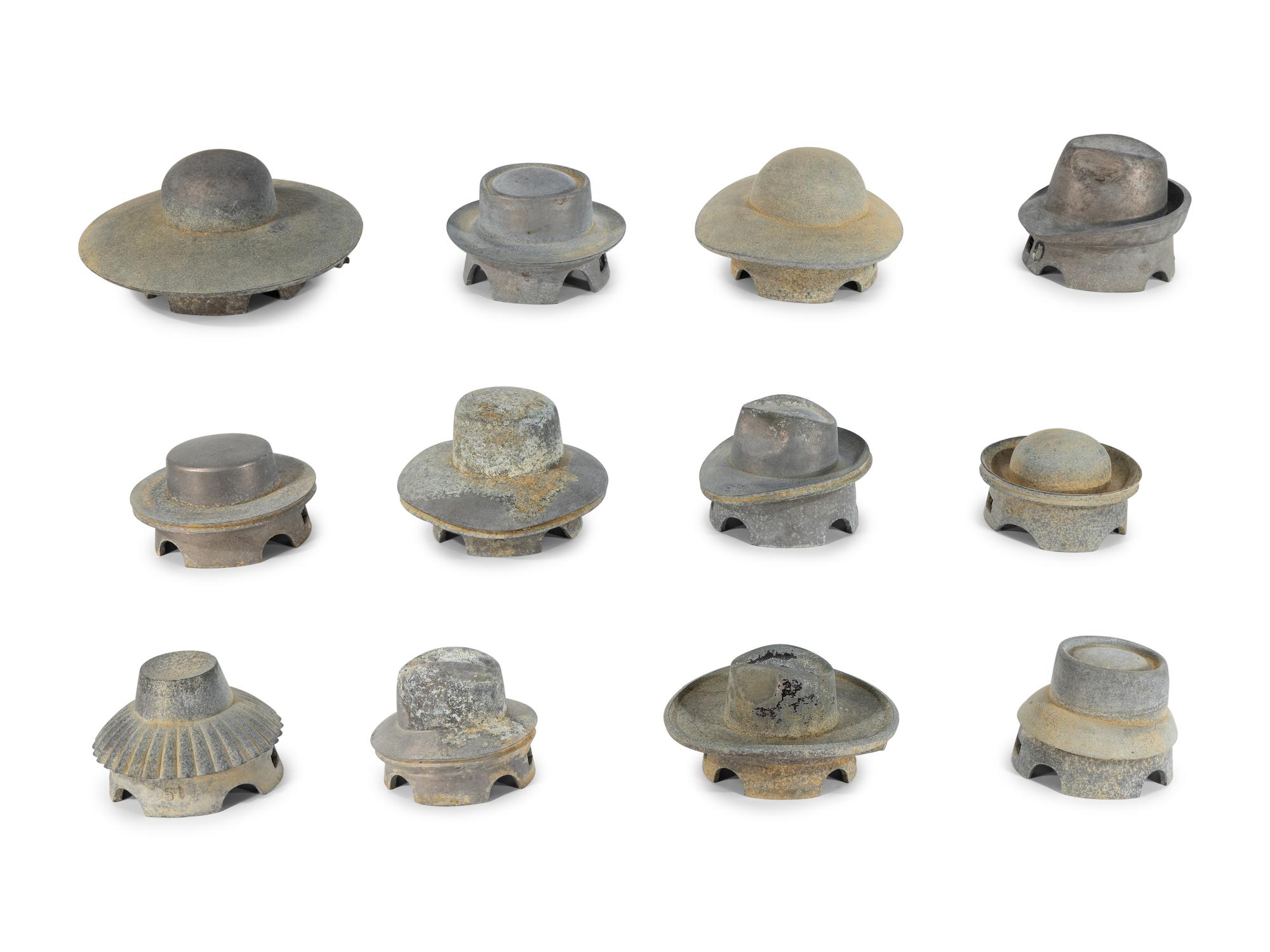 A Set of Twelve French Lead Hat Blocks