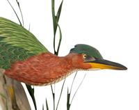 A Carved and Painted Shore Bird in Naturalistic Setting