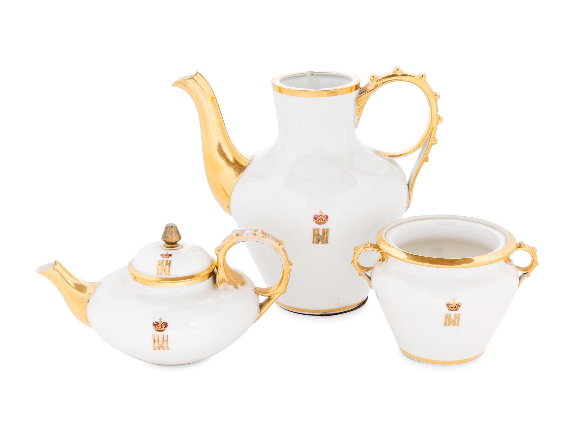 A Russian Porcelain Three-Piece Tea and Coffee Service