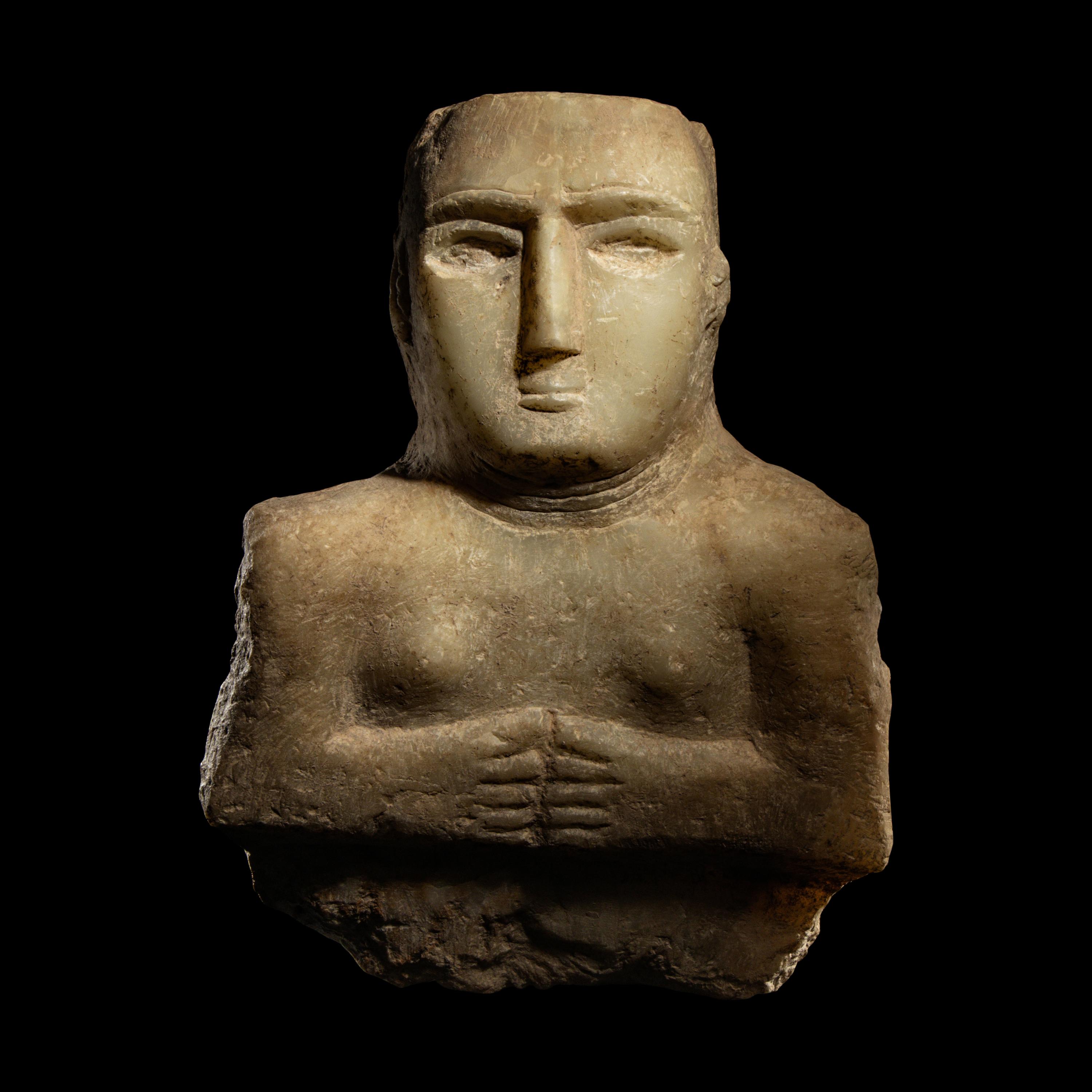 A South Arabian Alabaster Bust of a Woman