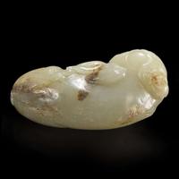 A Chinese carved pale celadon-grey and beige jade Buddhist lion 青灰玉雕太狮少狮 Qing dynasty ?