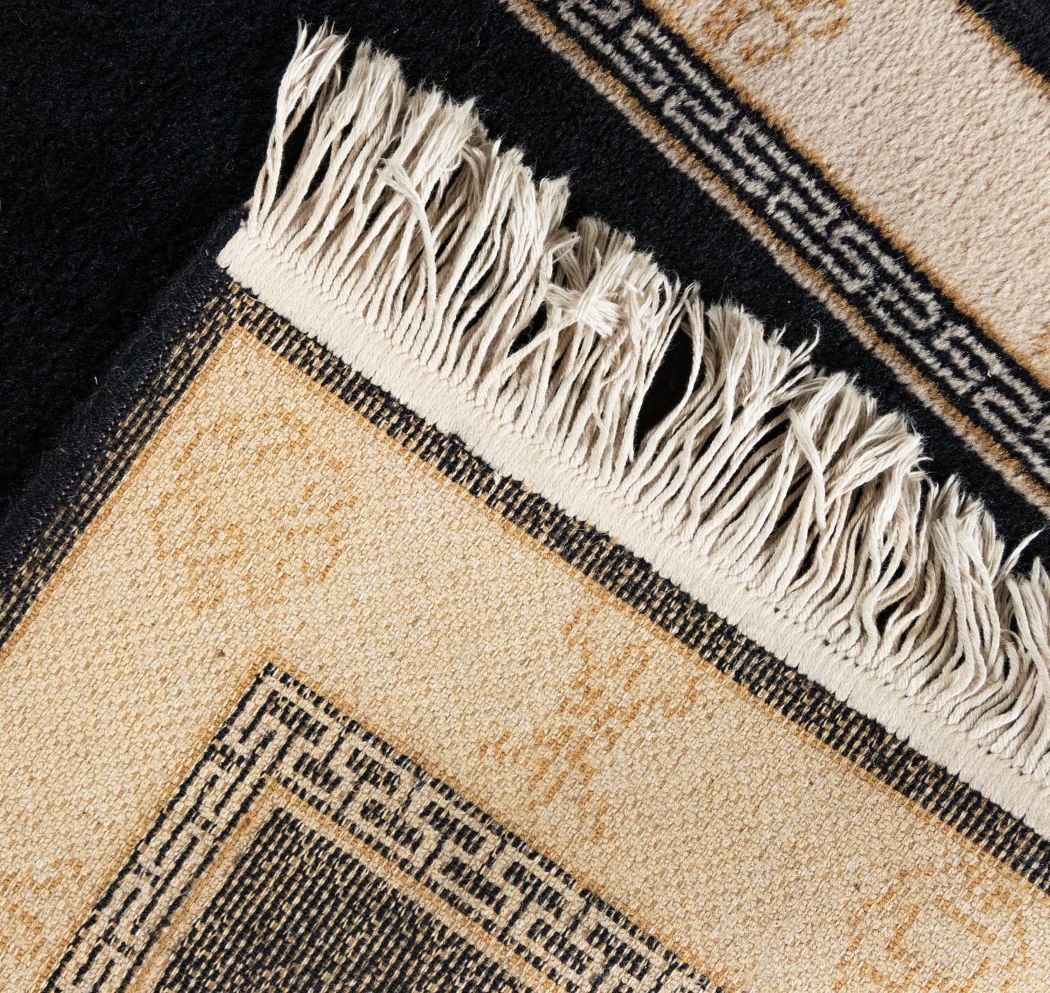 A Chinese Wool Rug and a Machine-Made Chinese Wool Runner