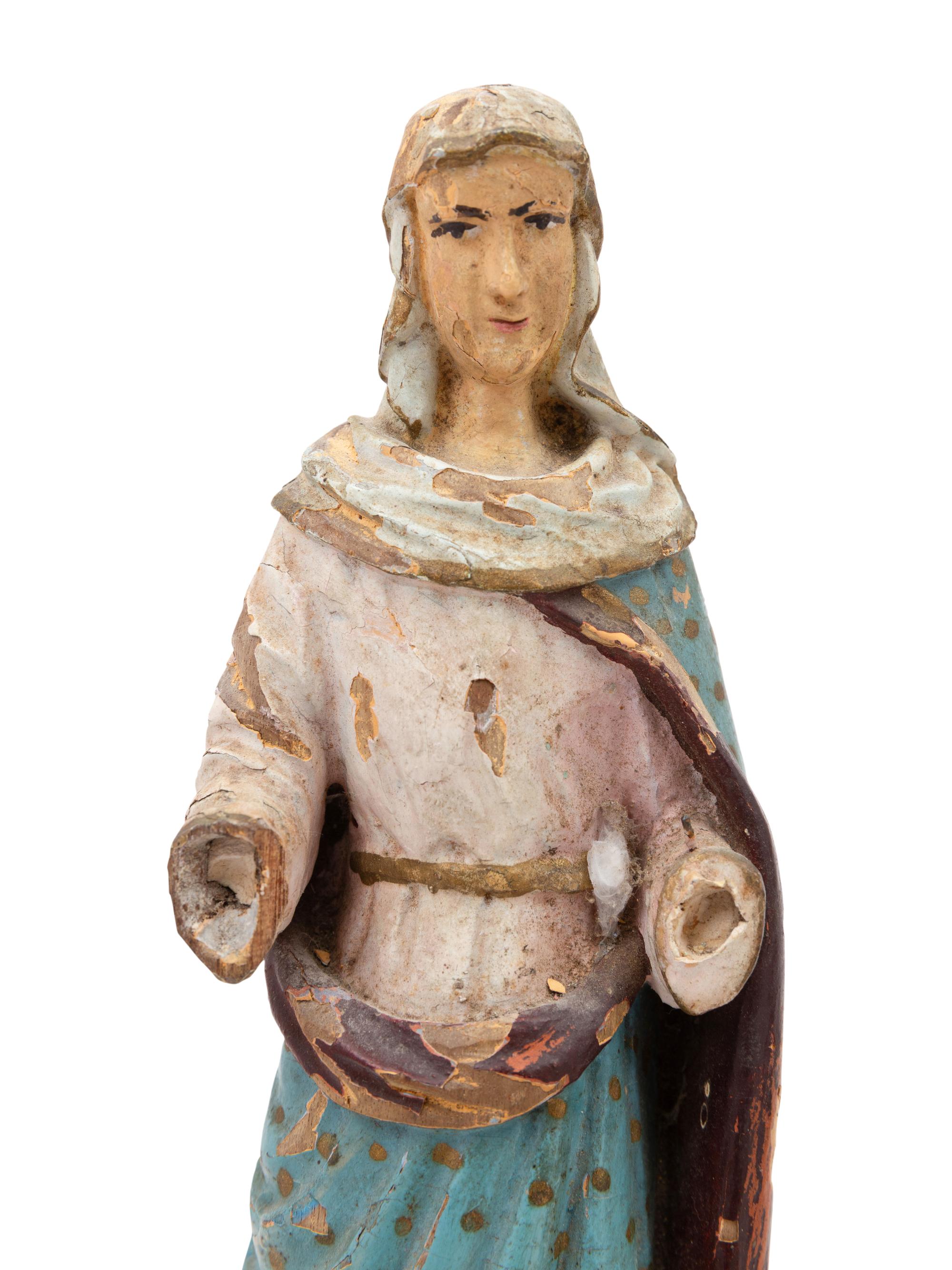 Seven Continental Carved and Polychromed Santos Figures
