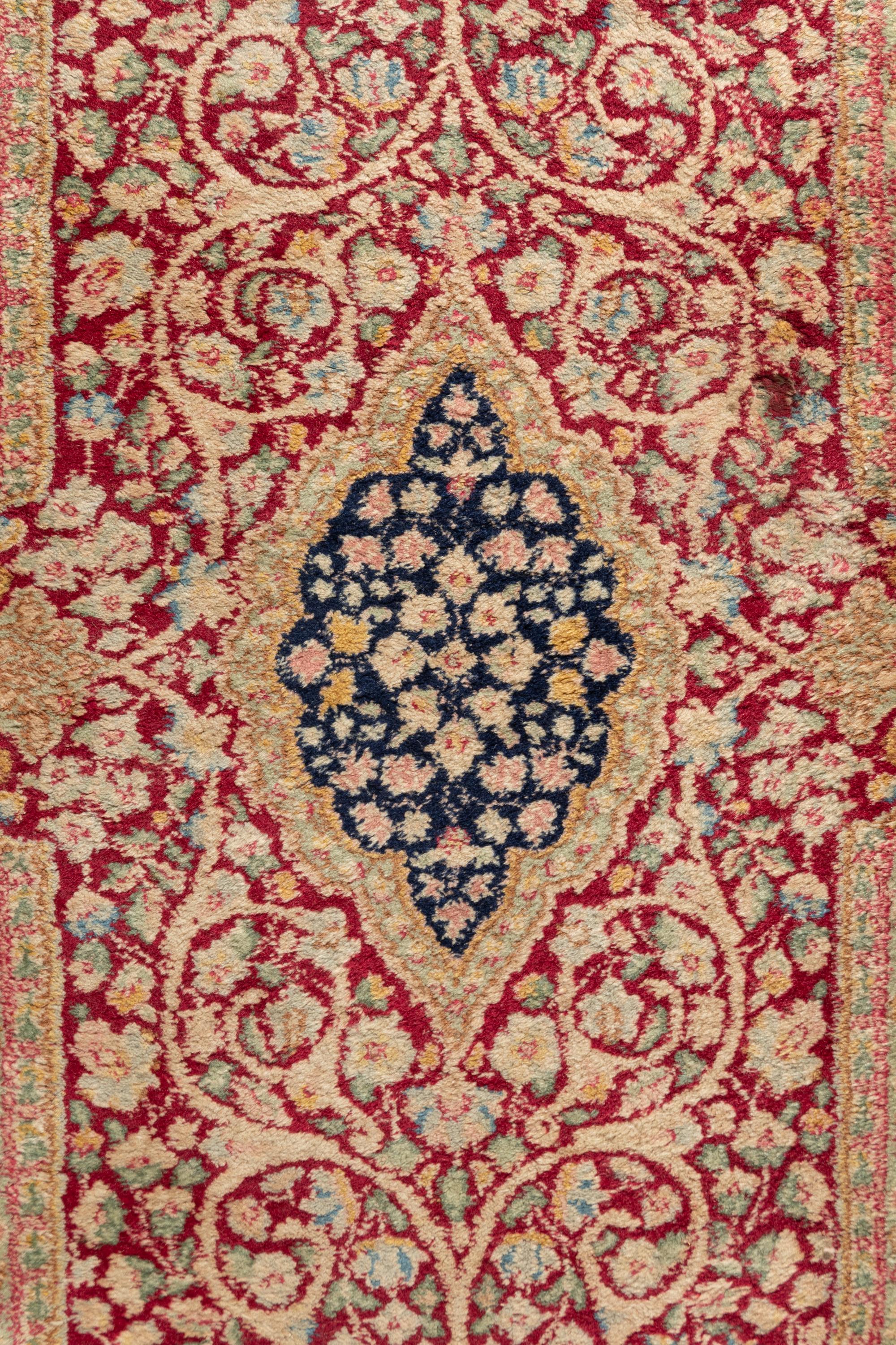 A Kirman Wool Rug