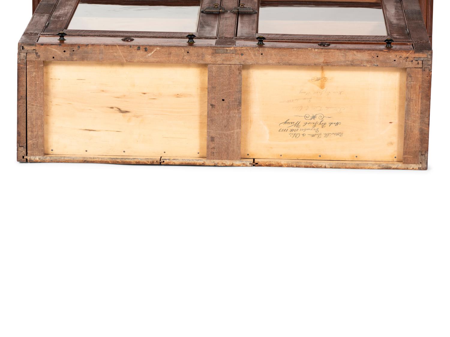 A Walnut and Curly Maple Desk and Bookcase by Jacob Werrey (1838-1893)