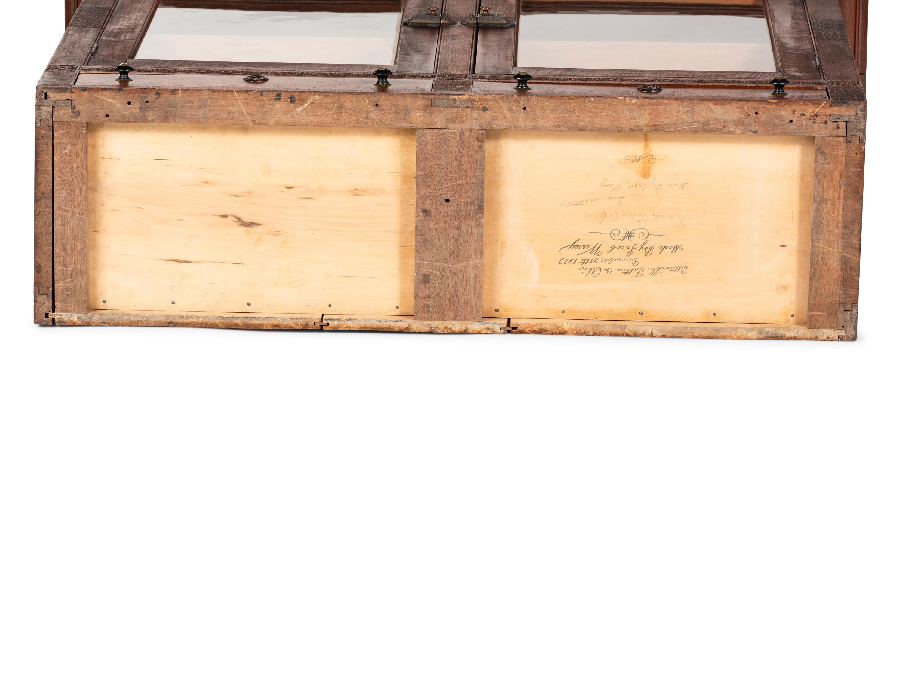 A Walnut and Curly Maple Desk and Bookcase by Jacob Werrey (1838-1893)