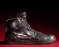 A Nike Air Jordan 1 Silver Cast Basketball Shoe Crafted for Michael Jordan's 32nd Birthday