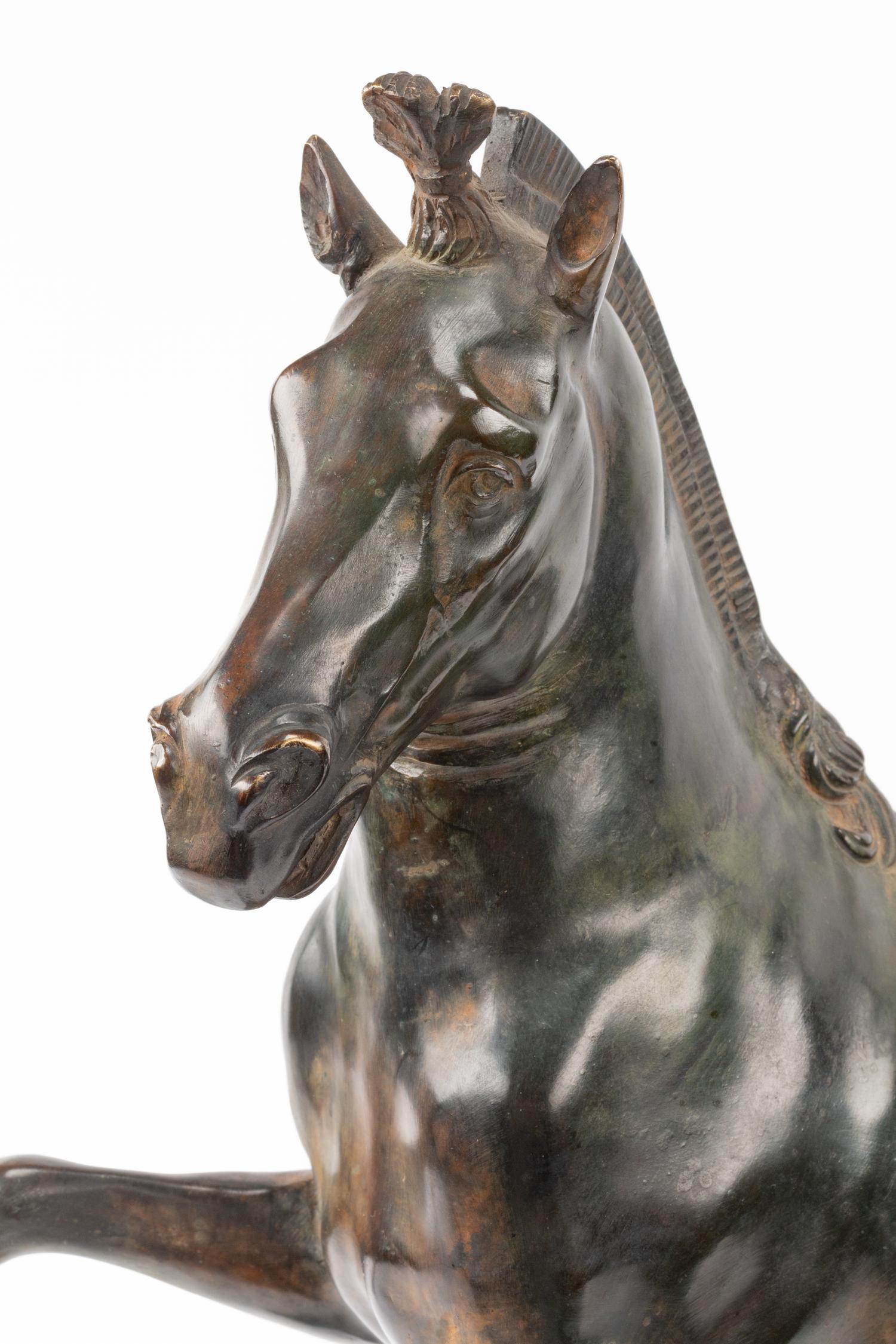 A Continental Bronze Model of a Horse on a Marble Base
