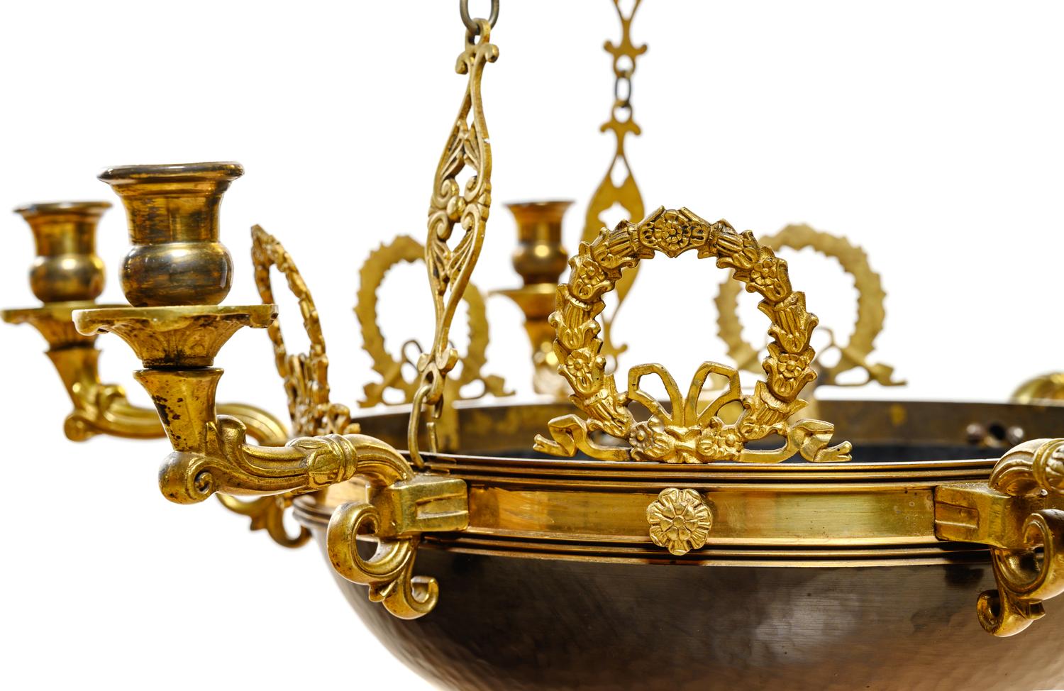 An Empire Style Gilt Bronze and Tôle Six-Light Chandelier
