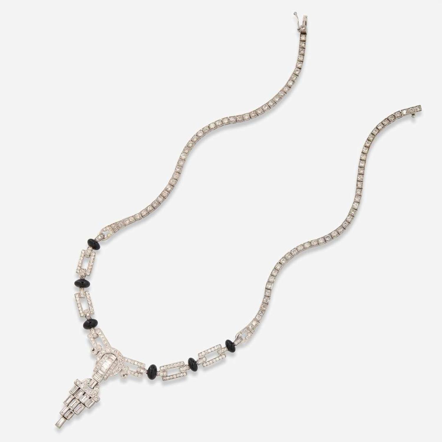 A Platinum, Diamond, and Onyx Necklace