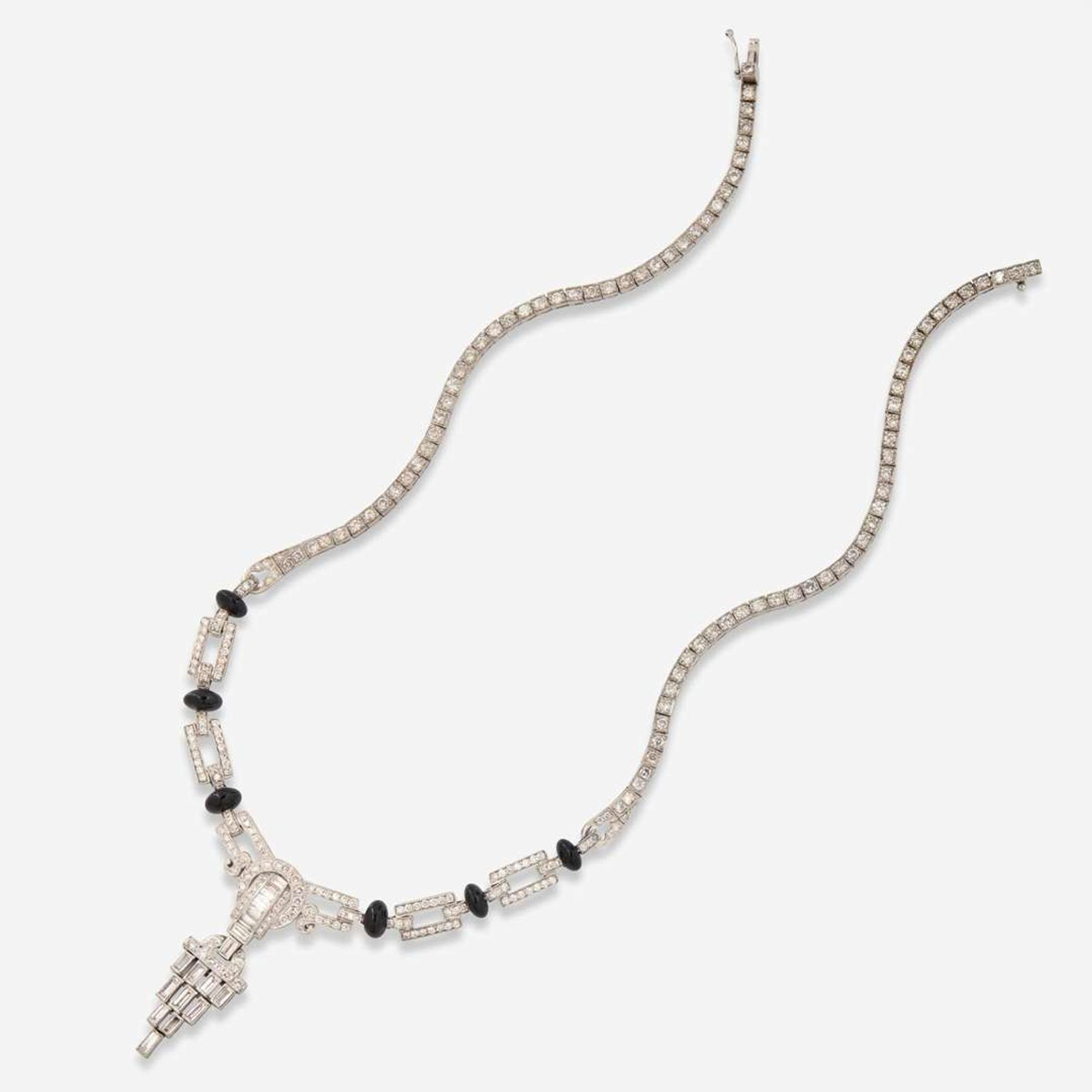 A Platinum, Diamond, and Onyx Necklace