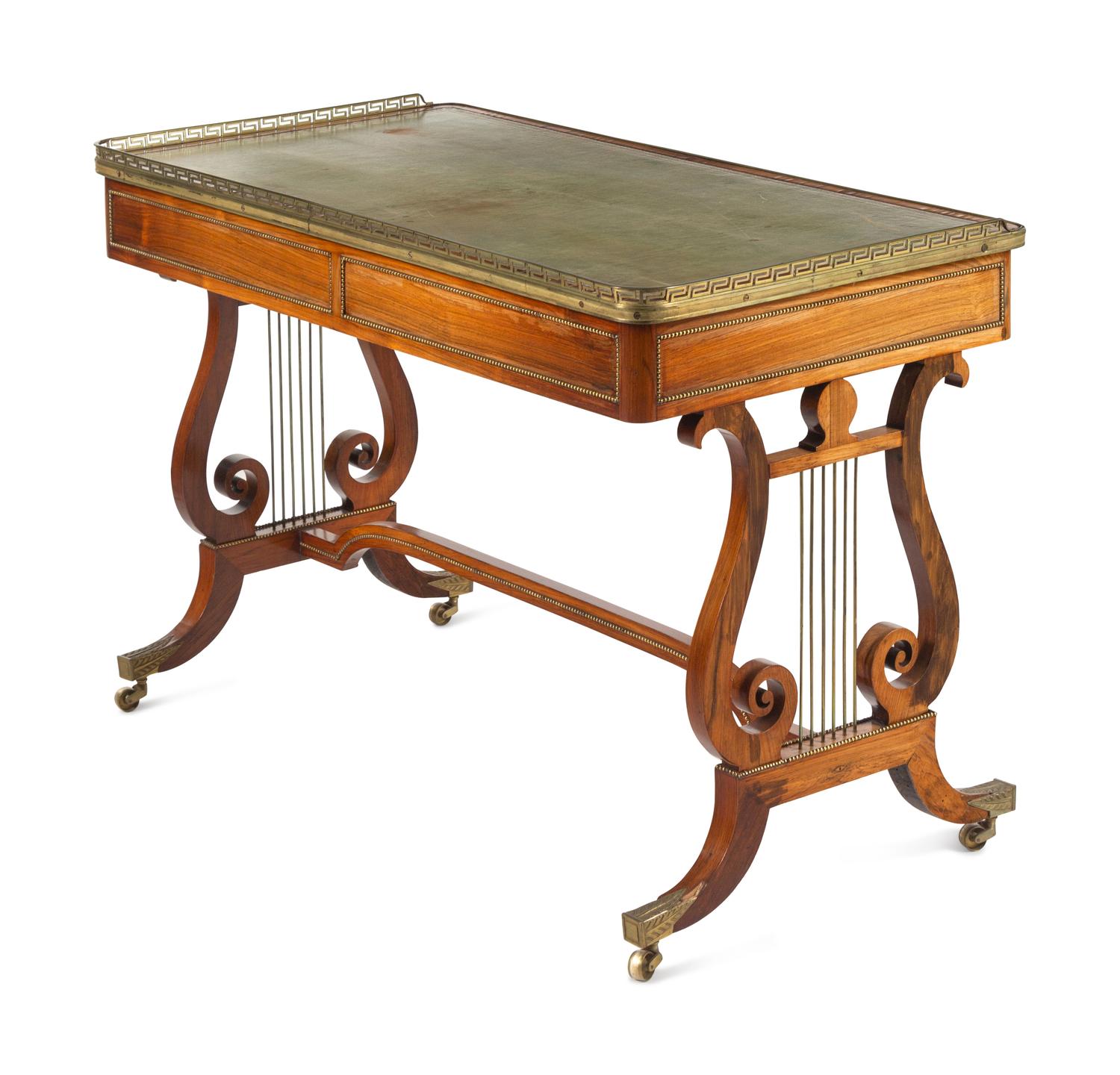 A Regency Brass Mounted Rosewood and Rosewood Grained Writing Table
