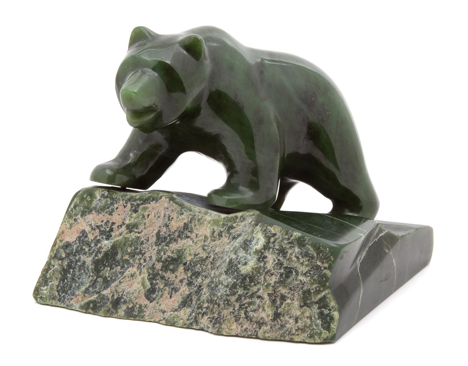 An Inuit Carved Green Onyx Bear on Rock Height 4 7/8 inches. — 20TH CENTURY
