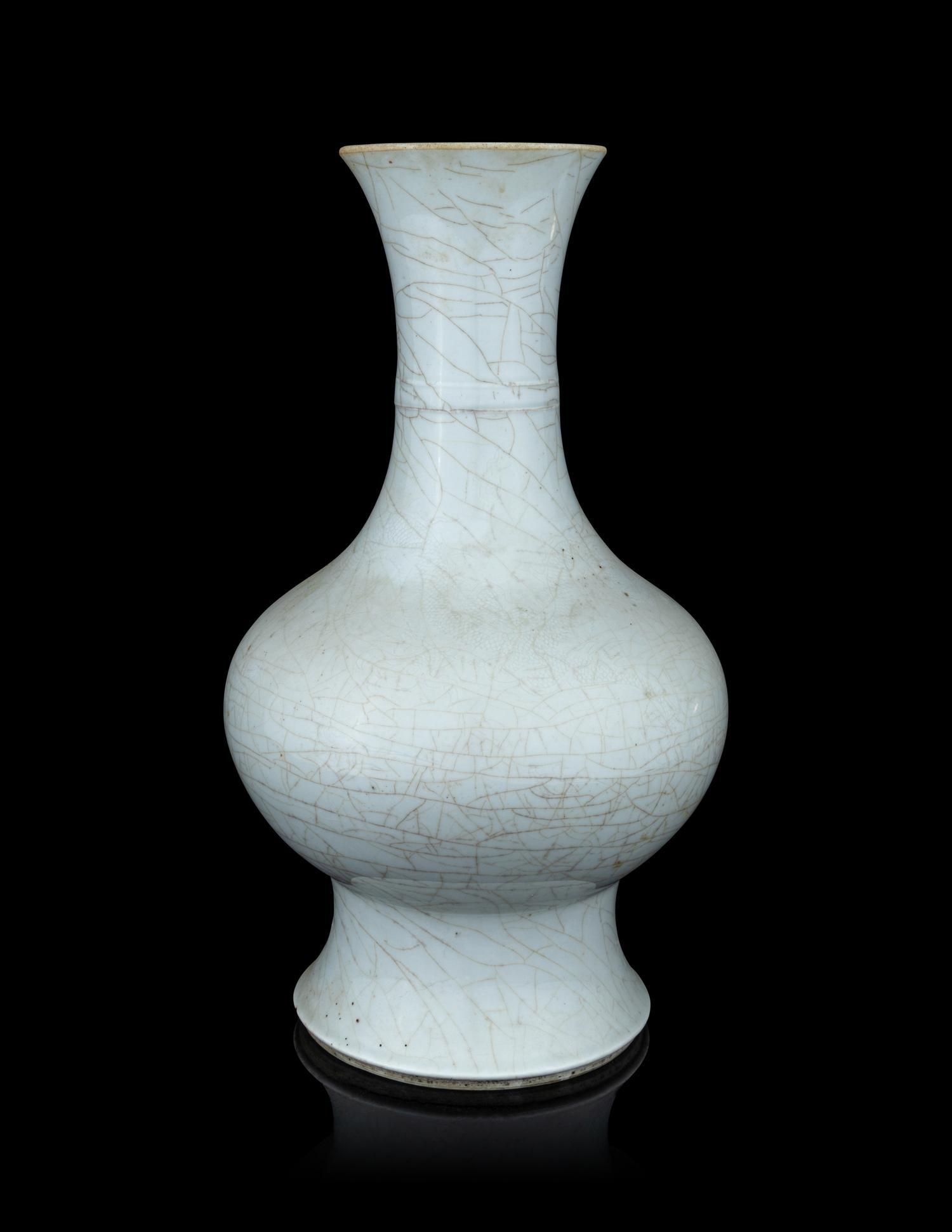 An Incised Pale Celadon Glazed Porcelain 'Dragon' Vase