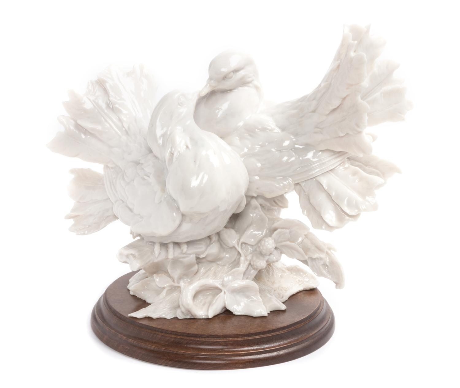 A Blanc de Chine Porcelain Figural Group Height 8 1/2 inches. — 19TH/20TH CENTURY