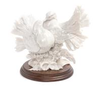 A Blanc de Chine Porcelain Figural Group Height 8 1/2 inches. — 19TH/20TH CENTURY