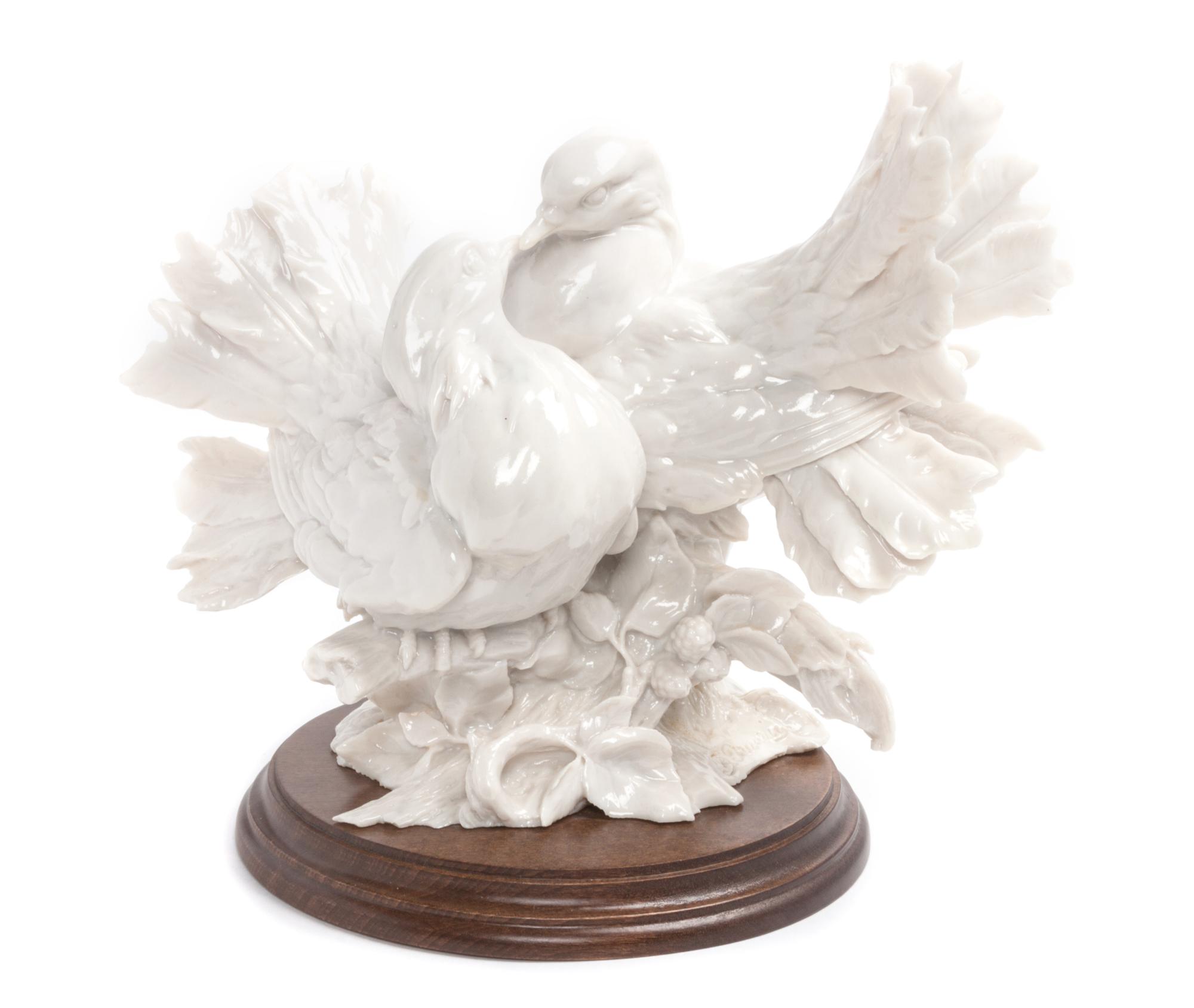 A Blanc de Chine Porcelain Figural Group Height 8 1/2 inches. — 19TH/20TH CENTURY