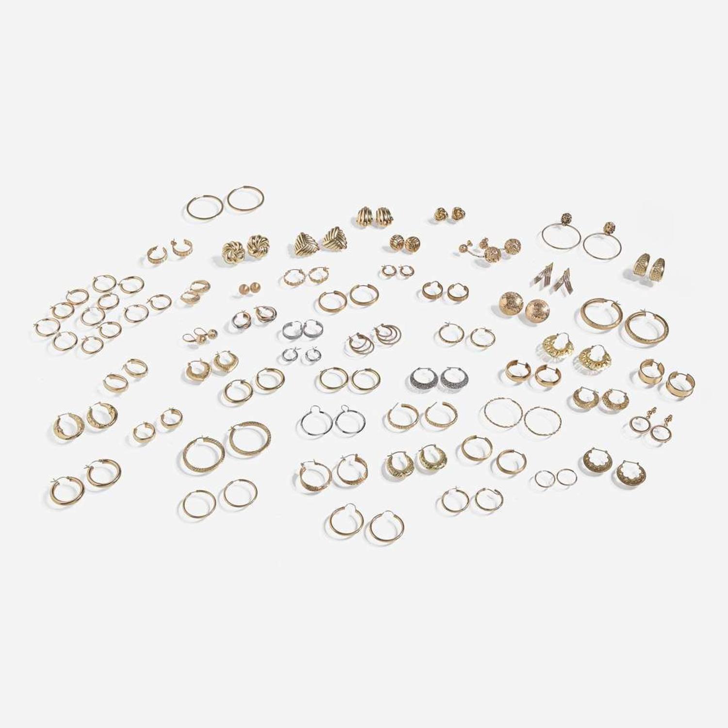 A Large Collection of 14K Gold Earrings