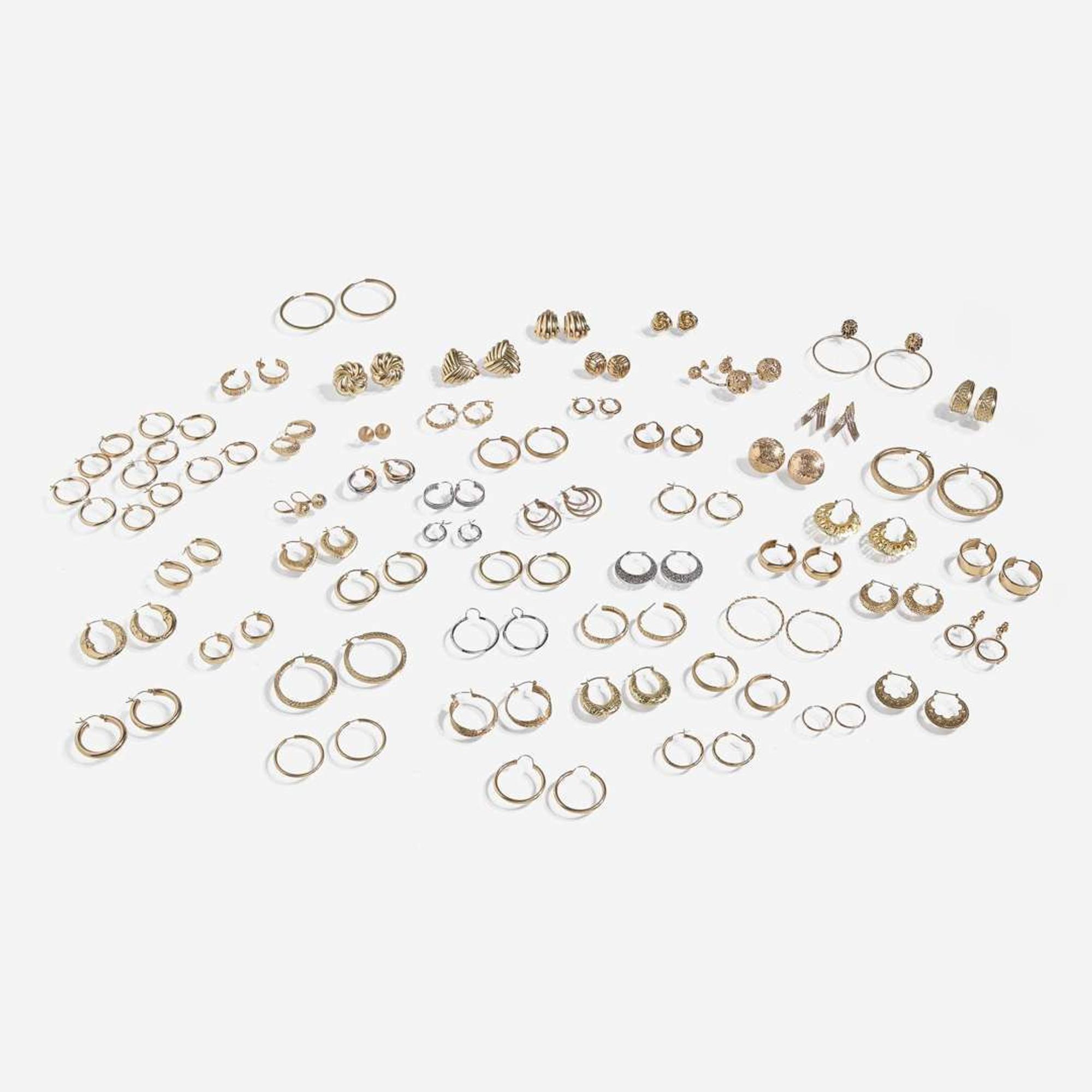A Large Collection of 14K Gold Earrings