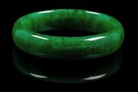 A Chinese Green Jadeite Bangle