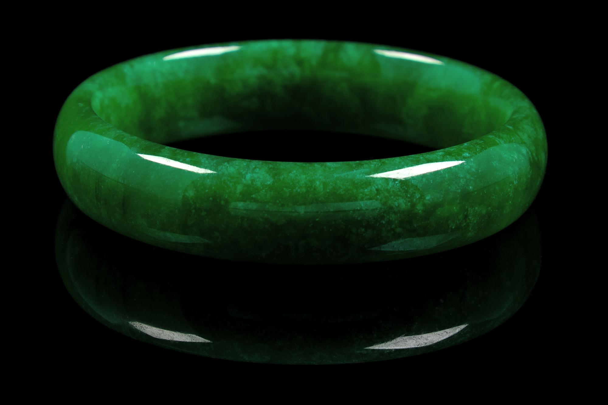 A Chinese Green Jadeite Bangle