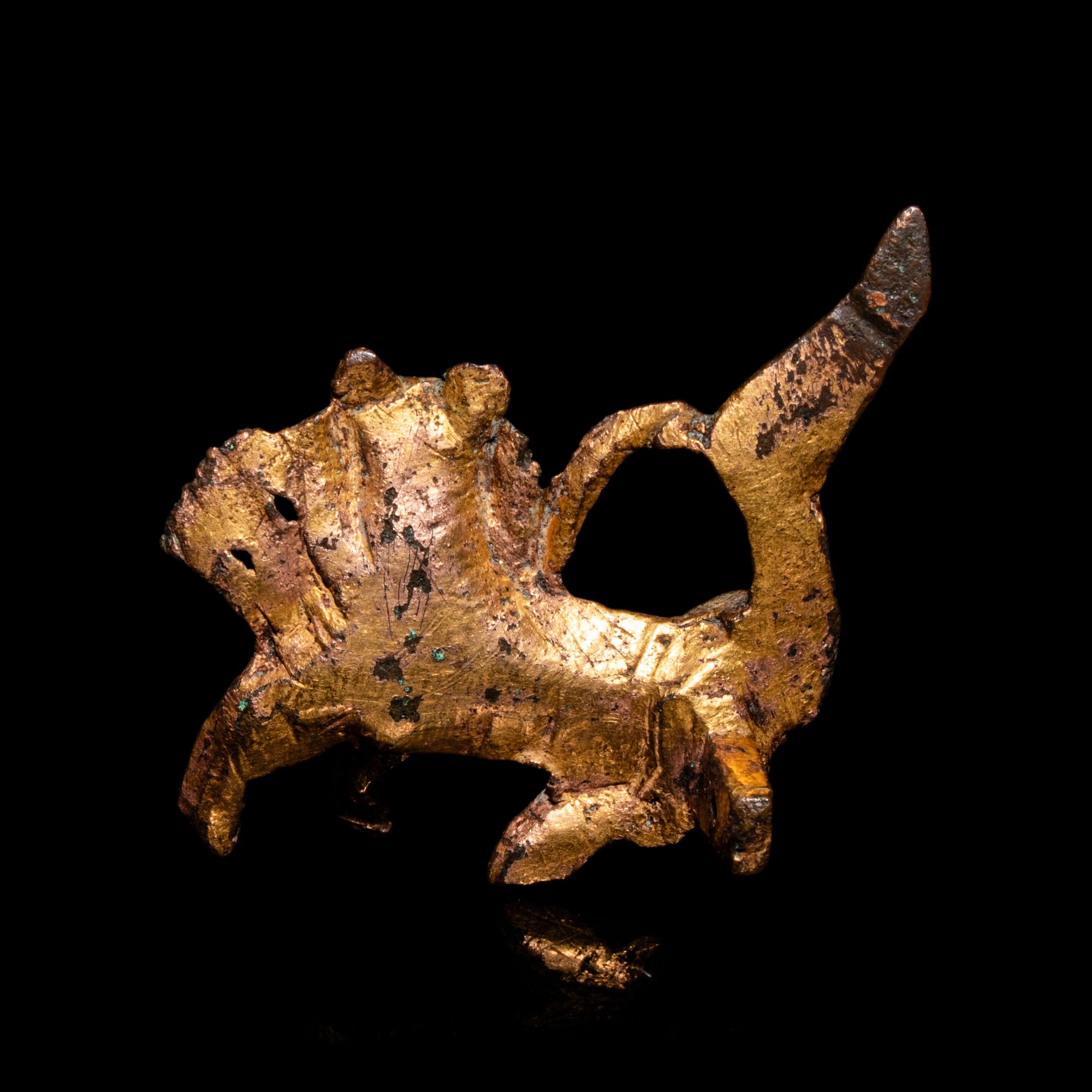 A Small Chinese Gilt Bronze Fu Lion-Form Decoration, Jin-Northern and Southern Dynasties 晉-南北朝 銅鎏金佛獅飾件