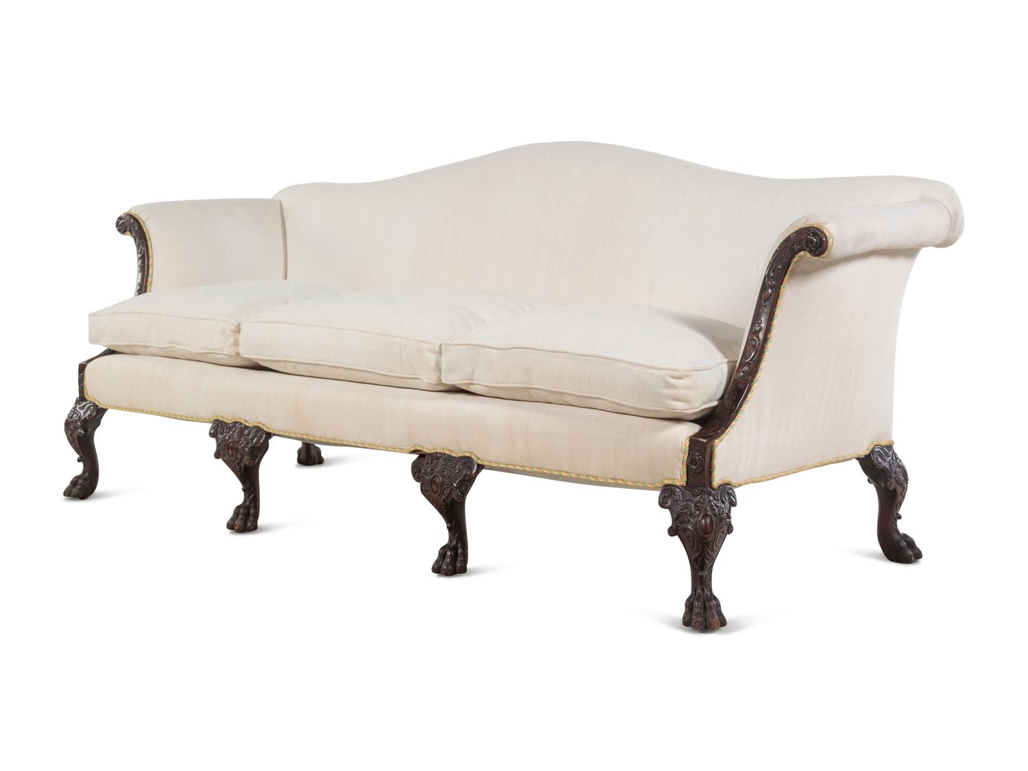 A George I Style Carved Mahogany Camelback Sofa