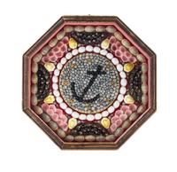 A Framed Sailor's Valentine Diameter of frame 9 inches.
