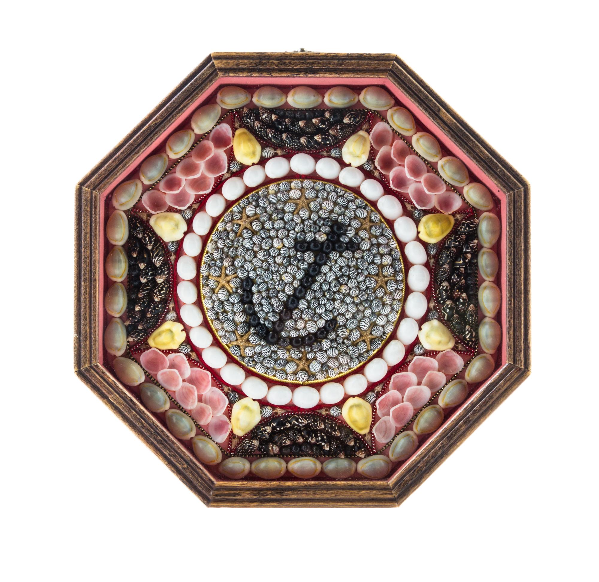 A Framed Sailor's Valentine Diameter of frame 9 inches.