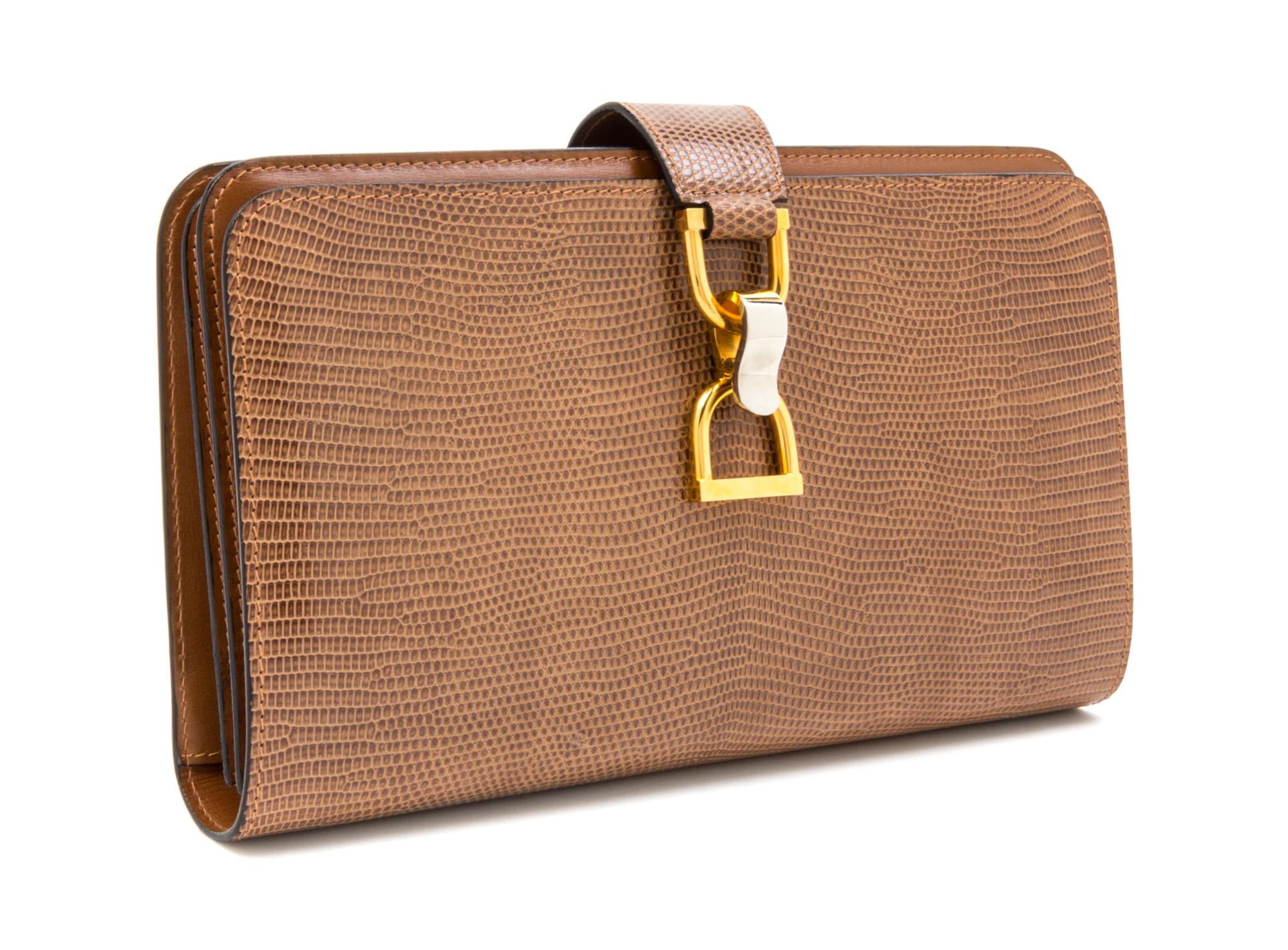 A Gucci Brown Skin Clutch, 10" x 6" x 1.5".